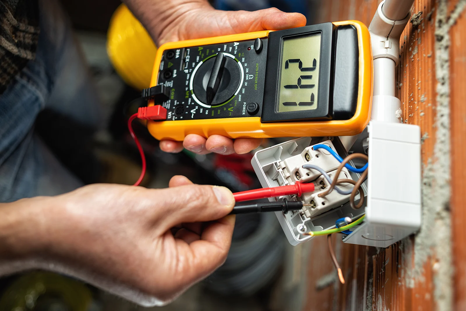 Licensed electrician wiring residential outlet in Burleson TX and surrounding DFW areas